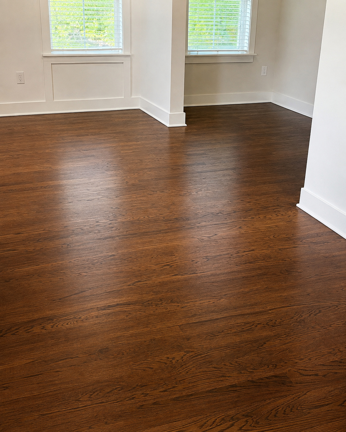 Durham hardwood floor in open living area after professional maintenance