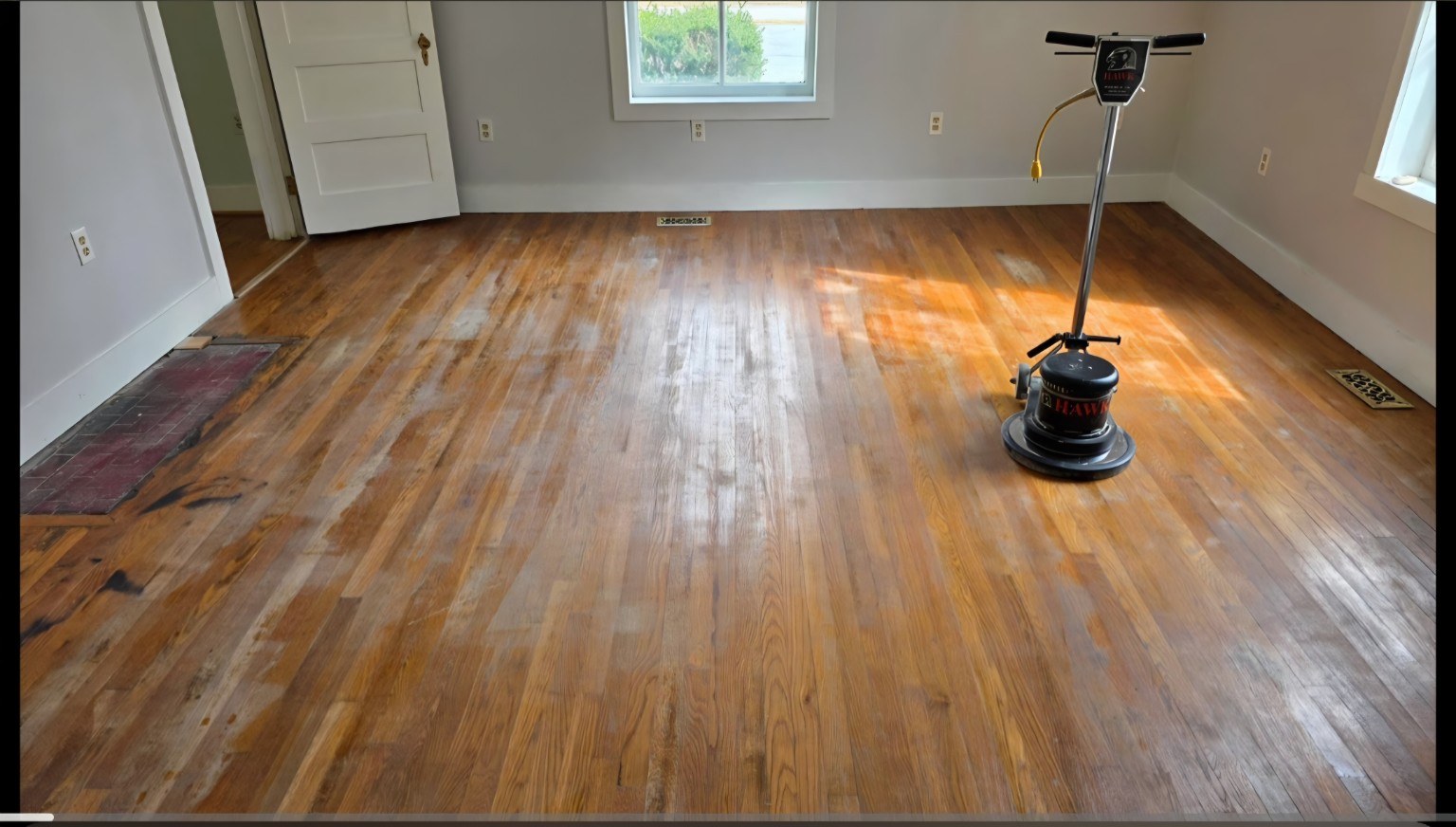 Historic New Bern hardwood floor before the screen and recoat process