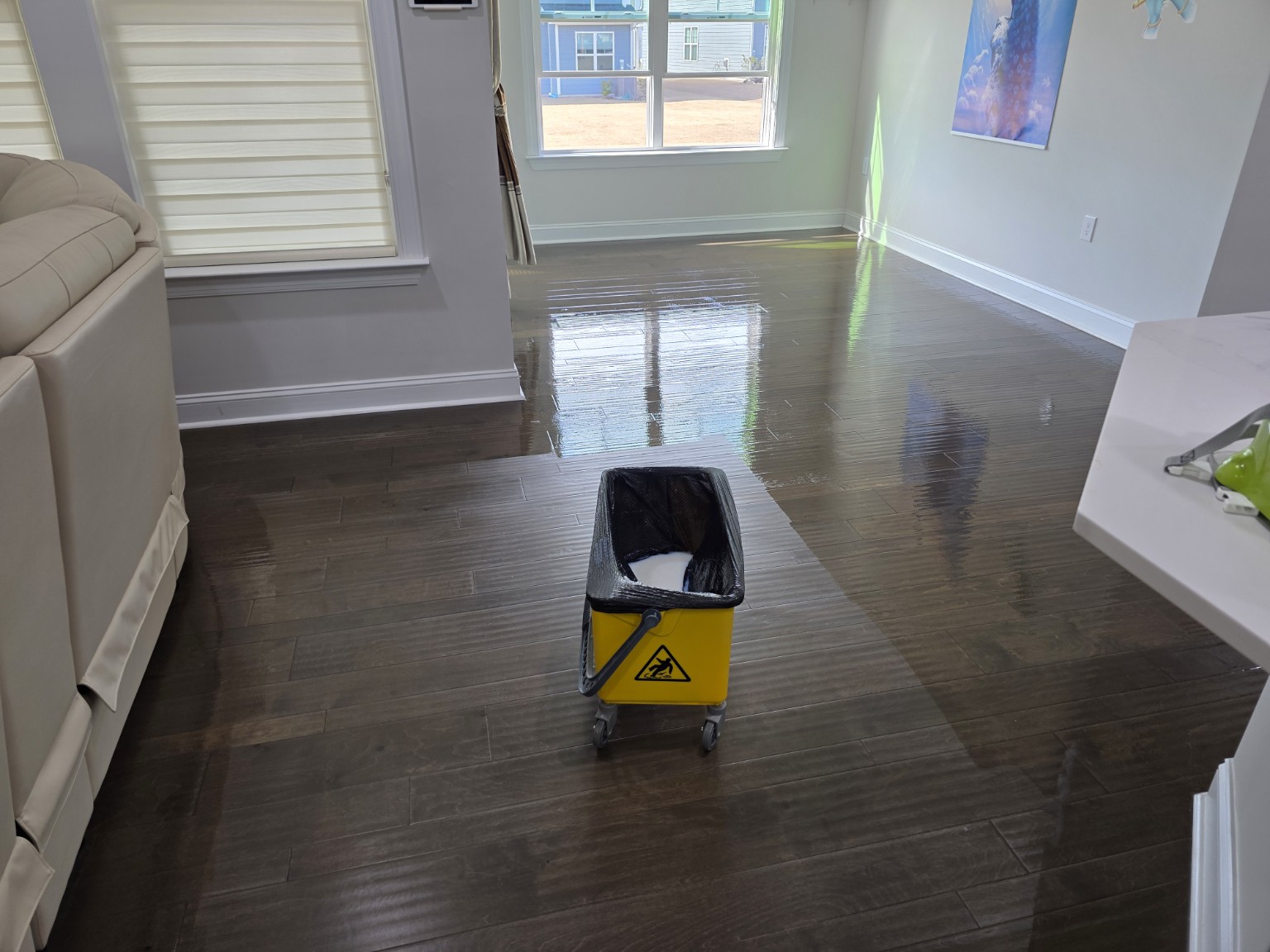 Finished engineered hardwood living area after screen and recoat