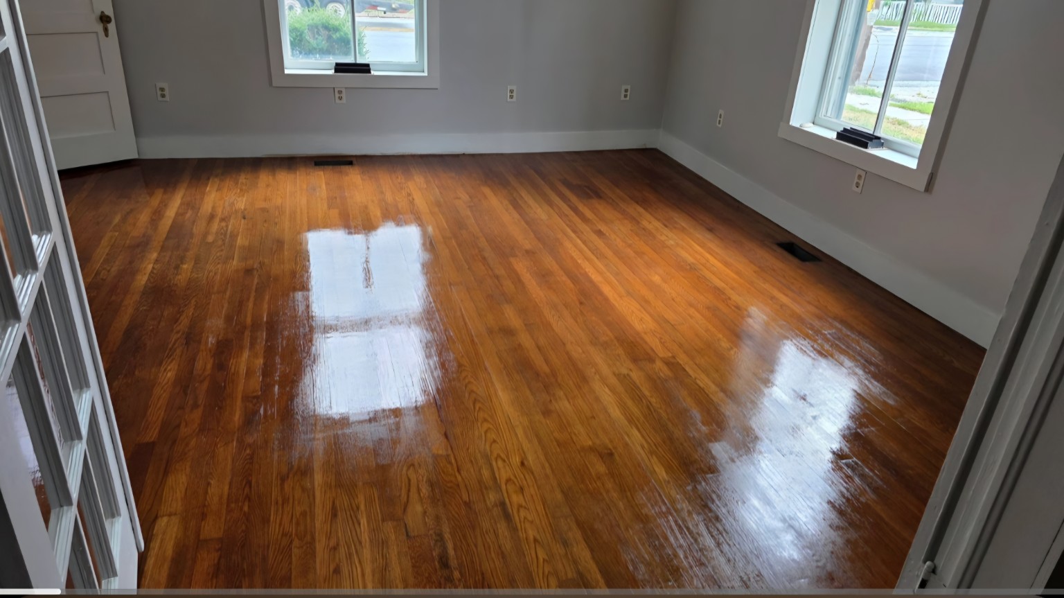 Before and after hardwood restoration project