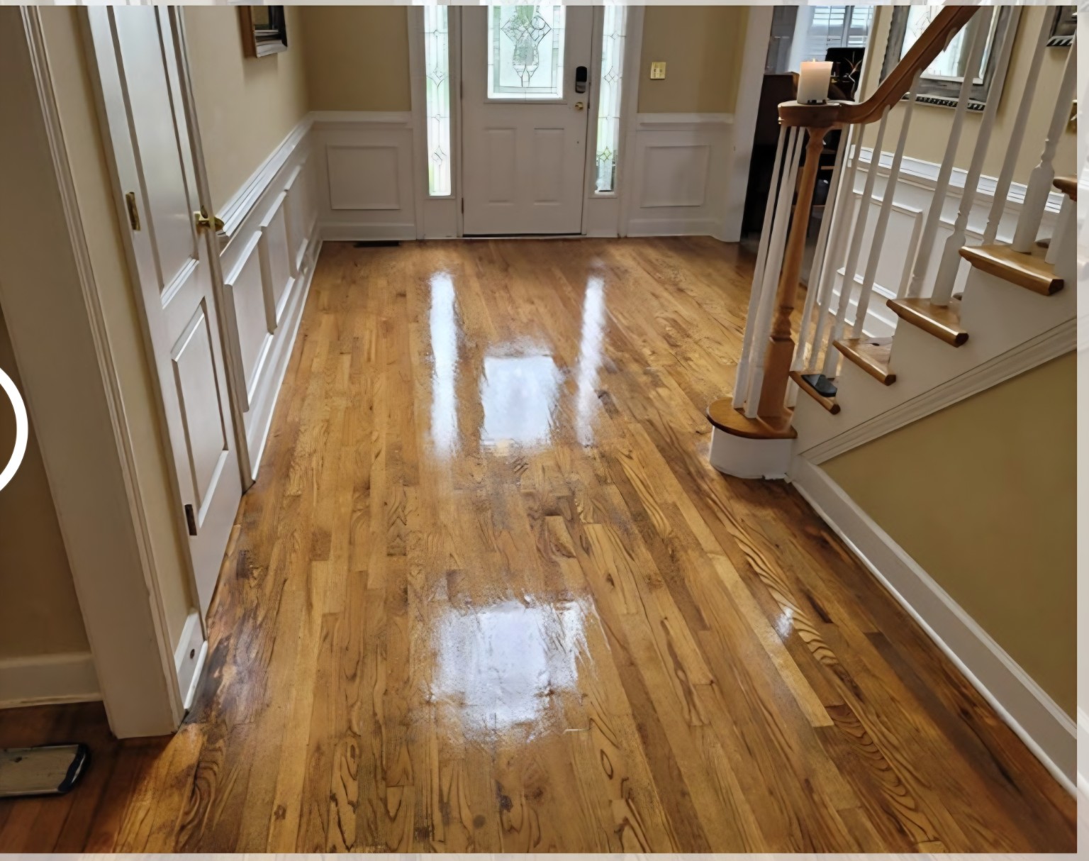 Professionally refinished hardwood floor with a fresh finished surface